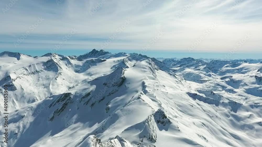 Amazing view from a drone over the snowy mountain hills Amazing view from a drone over the snowy mountain hills