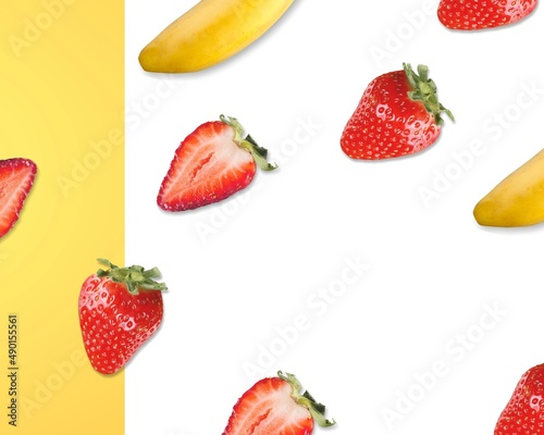 Creative layout made of strawberry and bananas on the background. Food concept.
