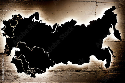 A black map of Ukraine, Russia and 15 republics of the Soviet Union hanging on a cracked wall
