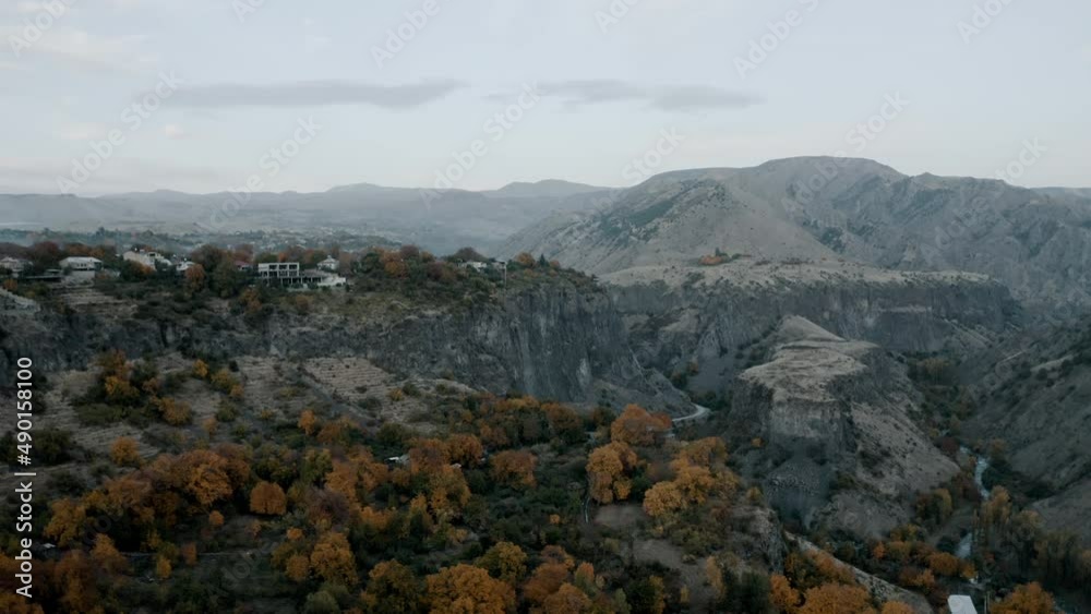 Aerial drone wide shot of Armenian beautiful mountains and hills in the evening in Garni, Armenia Aerial drone wide shot of Armenian beautiful mountains and hills in the evening in Garni, Armenia