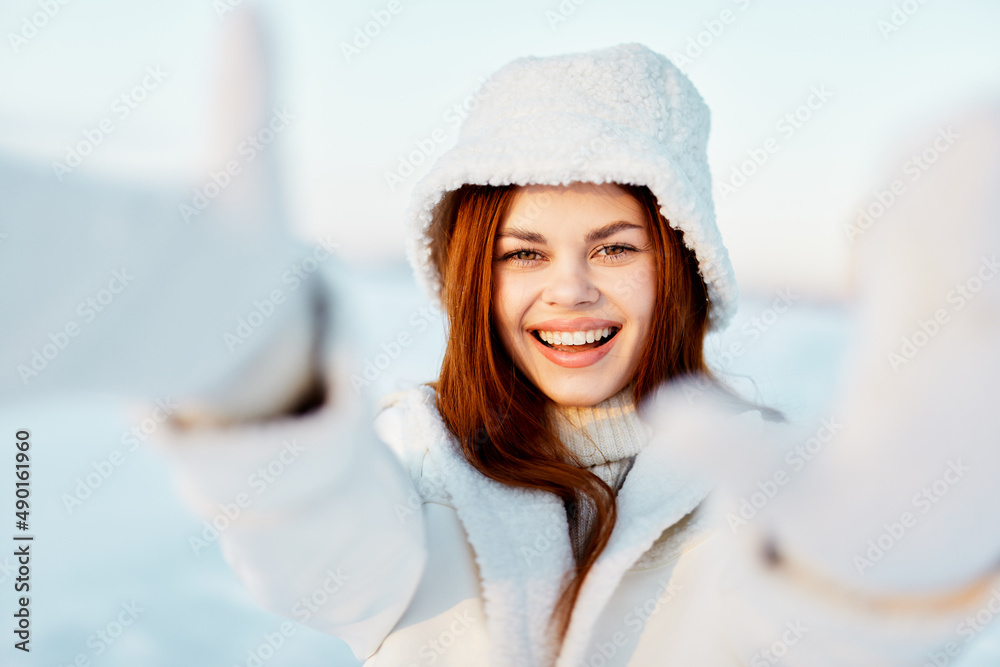 young woman red hair snow field winter clothes Fresh air