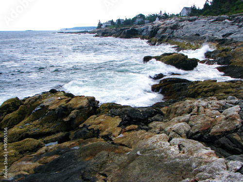 crashing waves on rock coastline