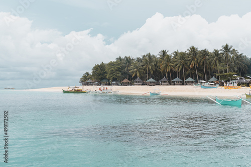 Beautiful view of sandy beach with palm trees in Cebu, Bantayan photo
