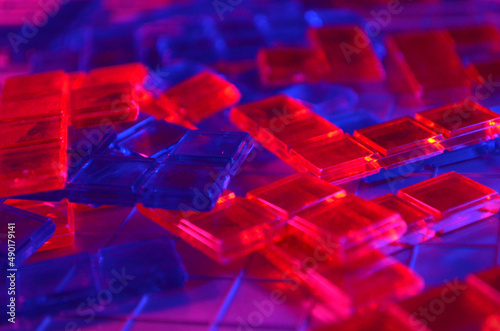 Red and Blue Plastic Pieces on a Grid | Plastic Tiles | Plastic Pieces | Red and Blue Lighting