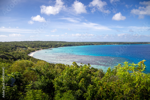 View over the clear blue waters of Easo Bay on Lifou Island in New Caledonia.