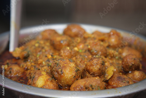 Dum Aloo spicy potato served with thick gravy photo