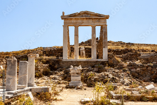 Daylight shot of the Greek ruins of the archaeological site of Delos Island, Greece photo