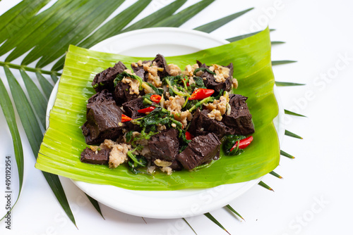 Stir-fried chicken blood cubes and minced pork with holy basil photo