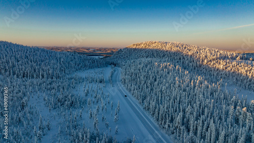 car driving in snowy winter road of Lapland 02