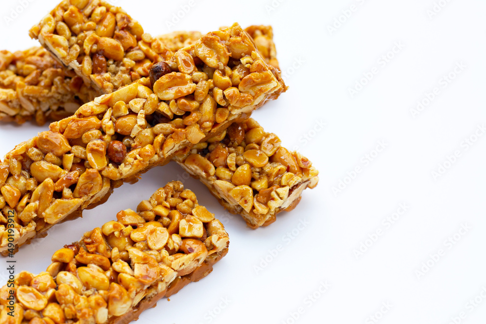 Peanut bar with almonds on white Peanut bar with almonds on white