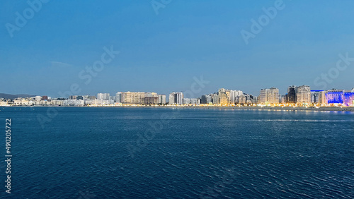Beautiful view of the blue sea with the city in the background. Tanja Marina Bay, Morocco.