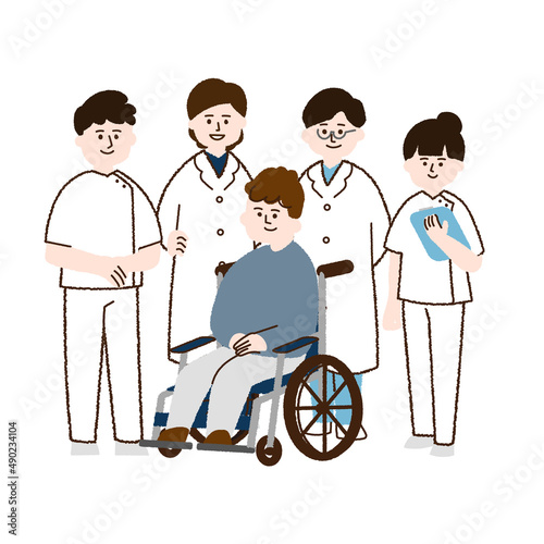 車椅子に座る男性と医療従事者