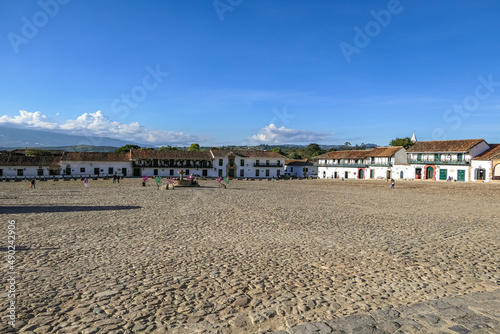 Panorama of the wide open Plaza Mayor of Villa de Leyva on a sunny day, Colombia 
