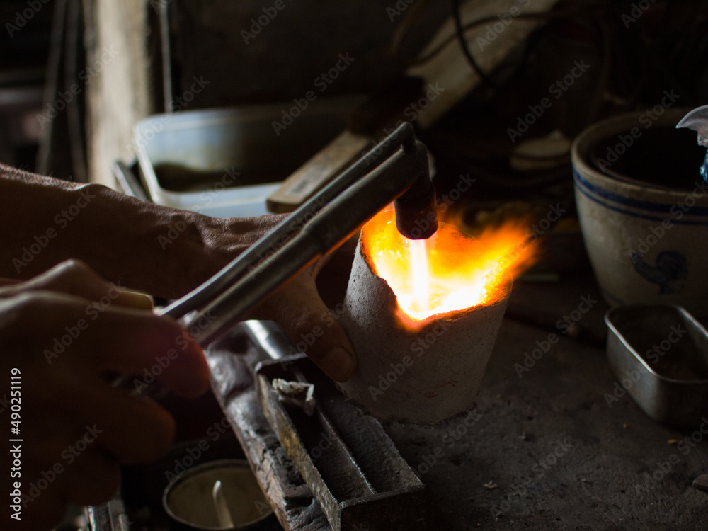 blacksmith working in the furnace blacksmith working in the furnace