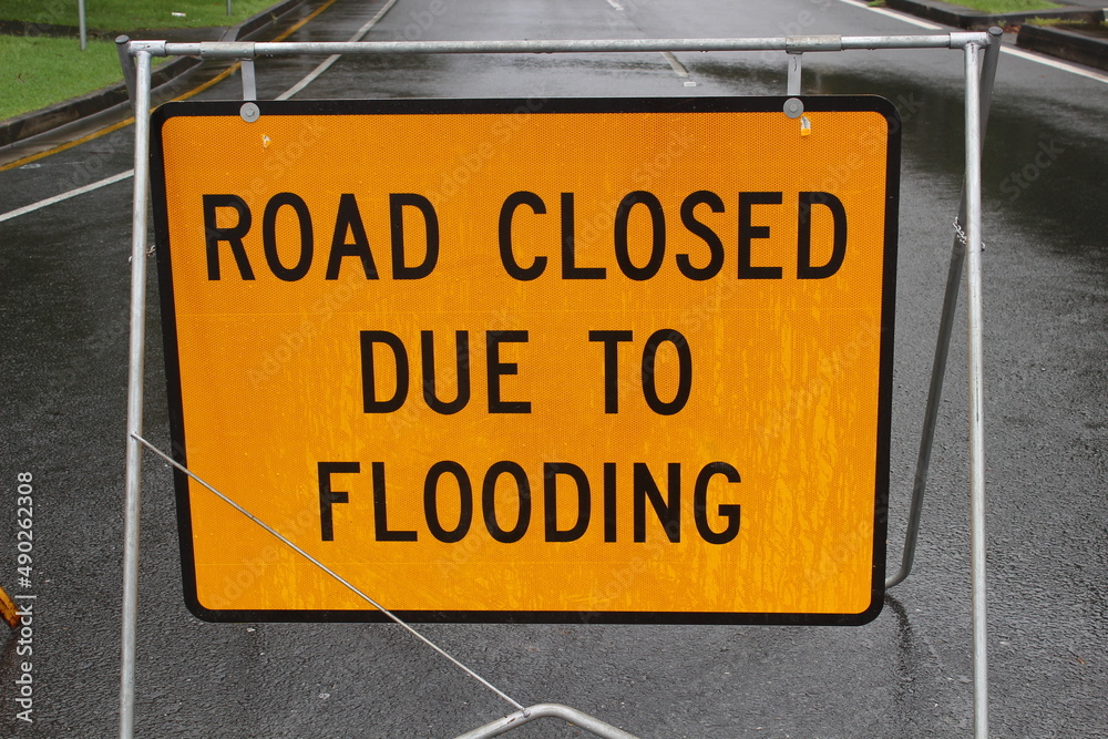 Close up on a road sign used during the recent Queensland, Australia floods Close up on a road sign used during the recent Queensland, Australia floods