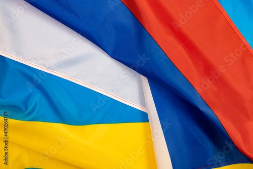Close-up on ukrain and russian flag