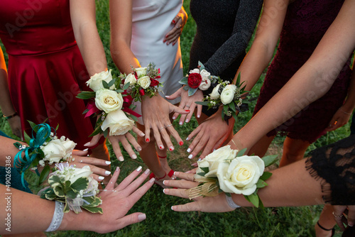 Photo A circle of wrist corsages before a school prom dance