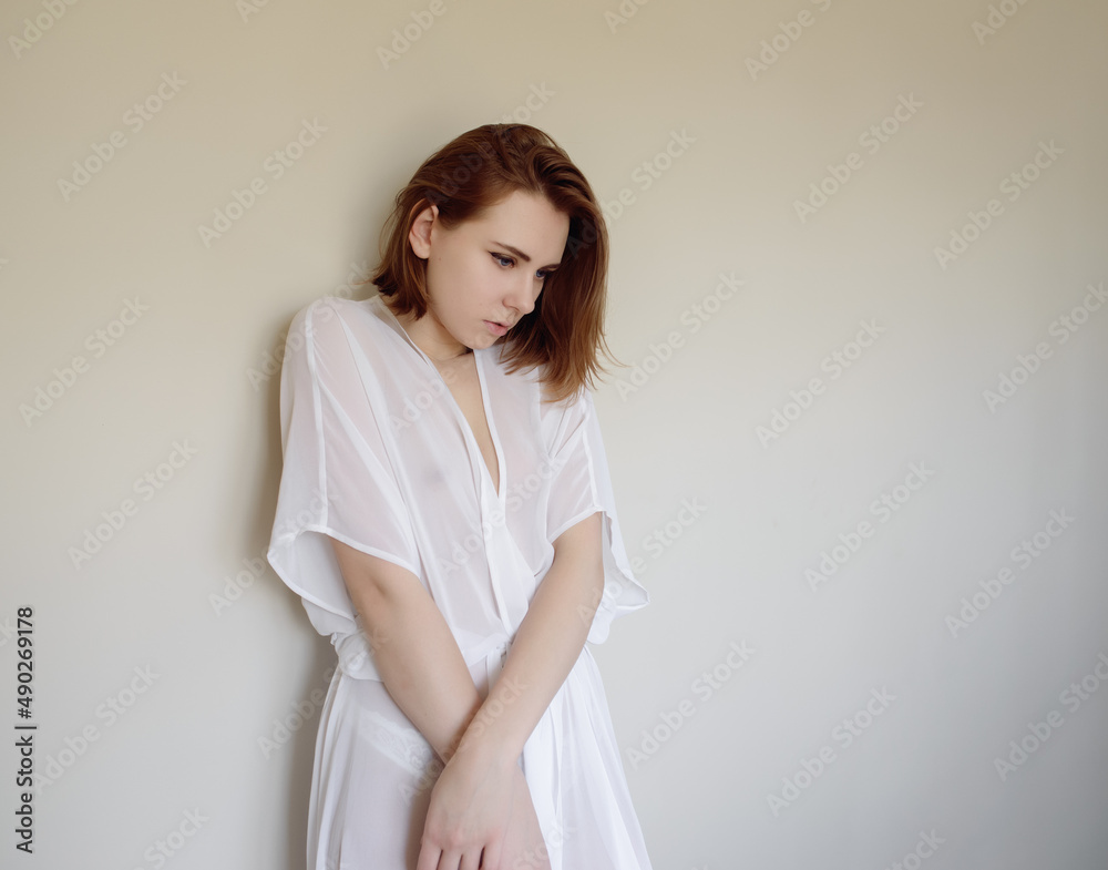 Portrait of a beautiful young woman with blue eyes. Portrait of a beautiful young woman with blue eyes.