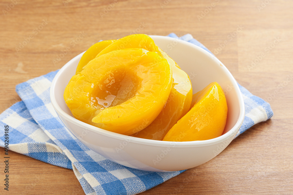 Sweet canned peaches with syrope Sweet canned peaches with syrope