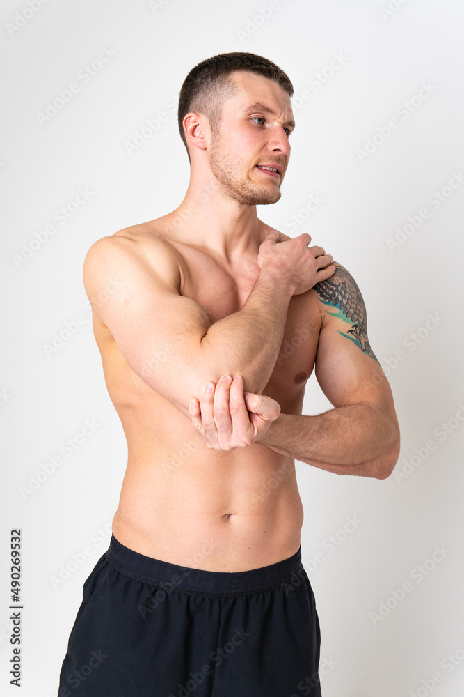 The elbow of the joint muscle in the male white background body injury, backache person isolated health stress, hand expression. Hold neck therapy, back suffer attractive The elbow of the joint muscle in the male white background body injury, backache person isolated health stress, hand expression. Hold neck therapy, back suffer attractive