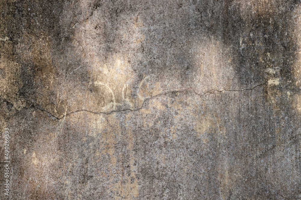 Cracked old concrete wall with heavy grunge texture for background Cracked old concrete wall with heavy grunge texture for background