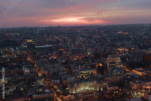 Pink sunset over the city of Dnipro. Drone photography. Warm evening city