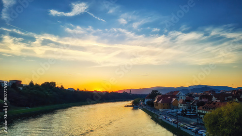 Maribor, Slovenia, Europe. Popular riverbank Lent by the river Drava. Beautiful sunset scenery