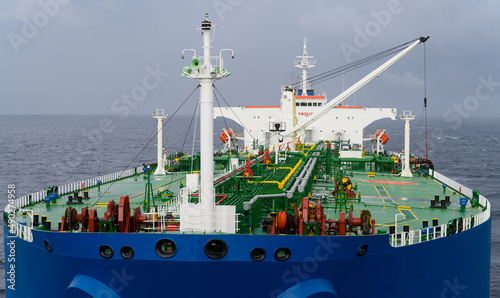 View along the deck of an oil tanker, above the central pipelines