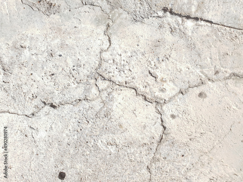 bumpy Cracked hard concrete surface