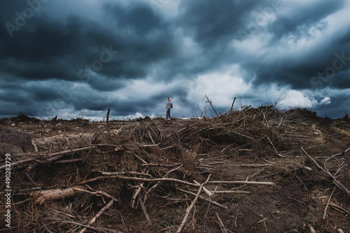 all were wiped off the face of the earth after the battle. black clouds over the world. the ground is pitted with caterpillars of tanks and guns. nuclear war concept. world on the brink of disaster