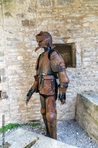 Medieval knight's armor exhibited in an old fortress