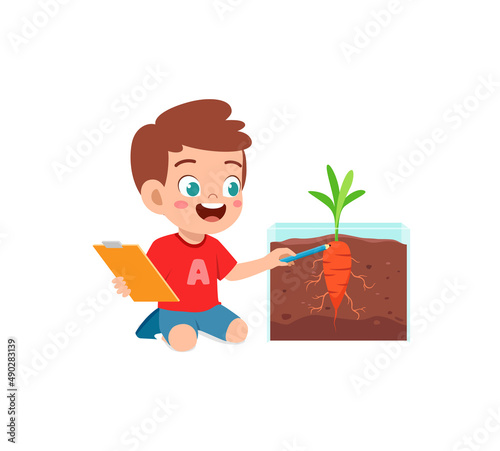 little boy observe plant growing in garden