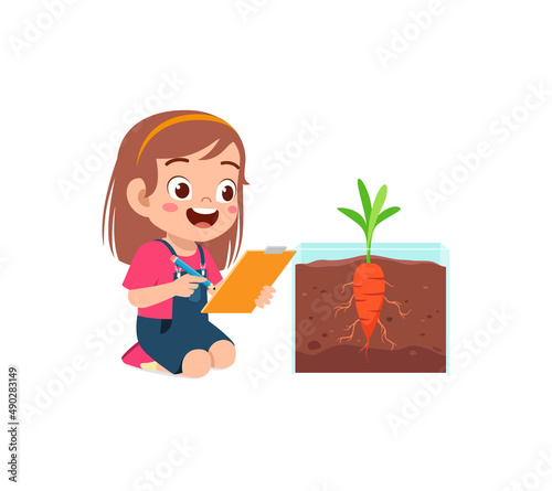 little girl observe plant growing in garden