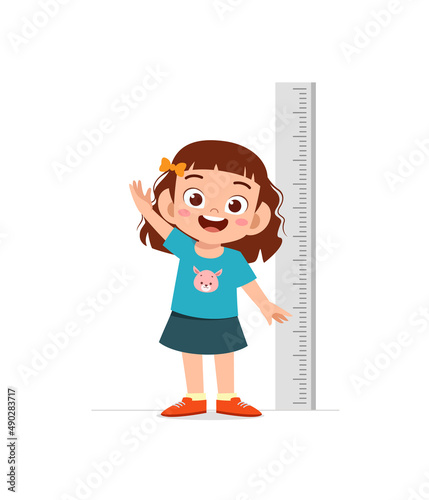 cute little girl measure height for grow progress