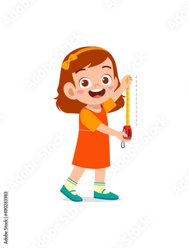 little girl holding measure tape and check length