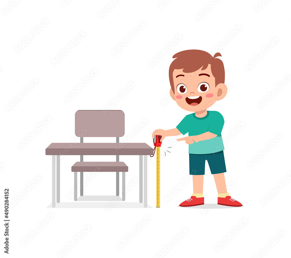 boy holding measure tape and check length of table boy holding measure tape and check length of table