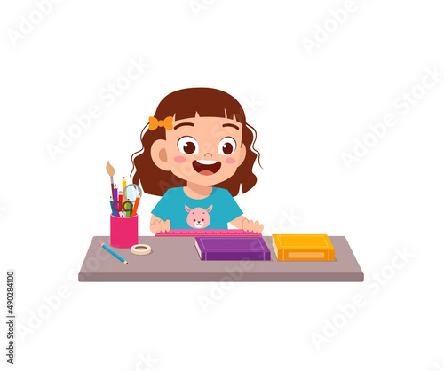 little girl holding ruler and check length