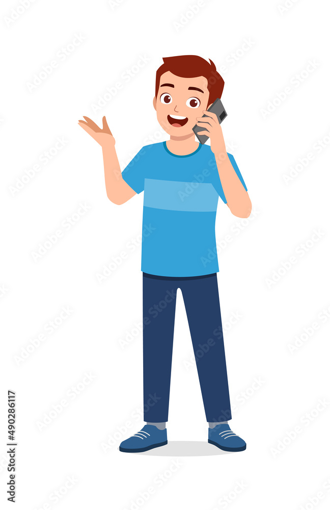 young man standing and talking using smartphone young man standing and talking using smartphone