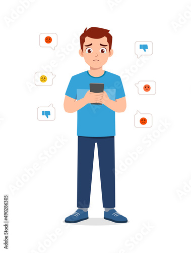 young man get bullied from internet and feel sad