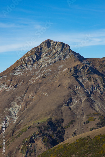 Beautiful mountain landscapes with peaks and valleys against a clear blue sky