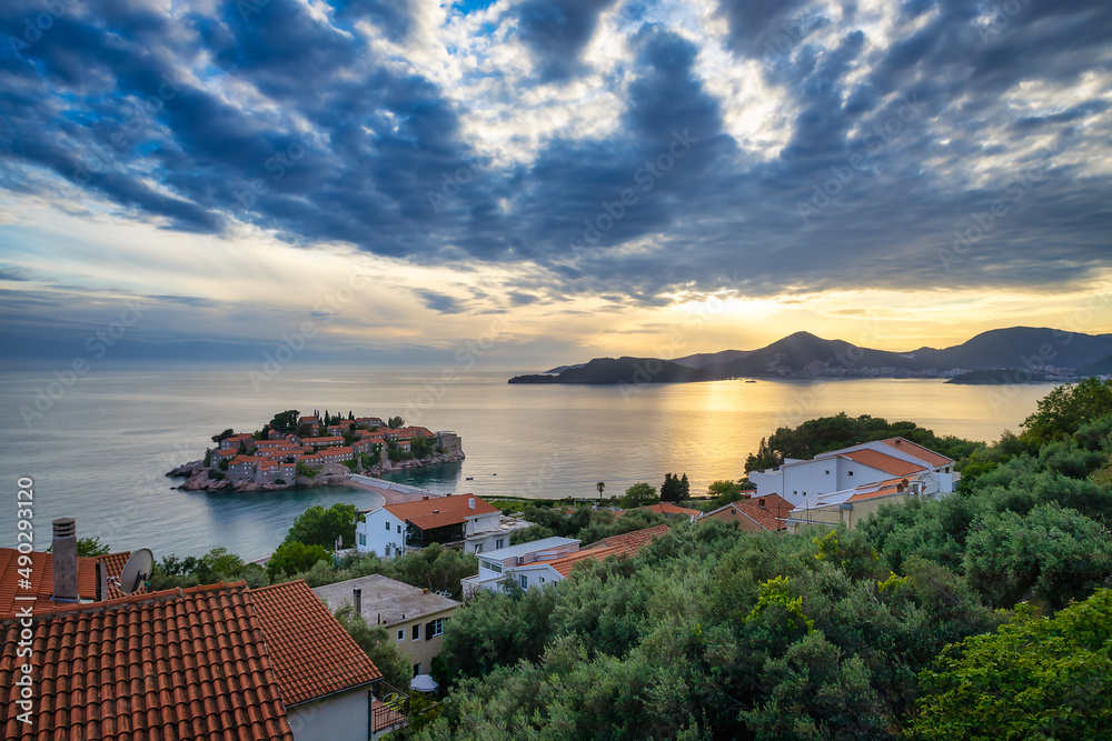 Sunset view of famous Sveti Stefan island in Montenegro
