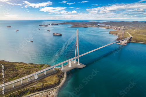 Aerial view of famous cable-stayed bridge to Russky island from Vladivostok city in Far East of Russia photo
