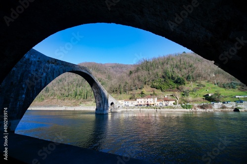 bridge over lake image taken in ponte del diavolo, borgo a mozzano, tuscany , italy photo