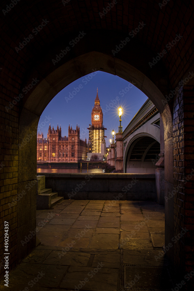 The Elizabeth Tower in Westminster, commonly known as Big Ben, and Westminster Bridge at dawn.