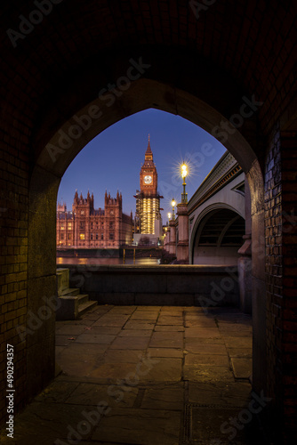 The Elizabeth Tower in Westminster, commonly known as Big Ben, and Westminster Bridge at dawn.