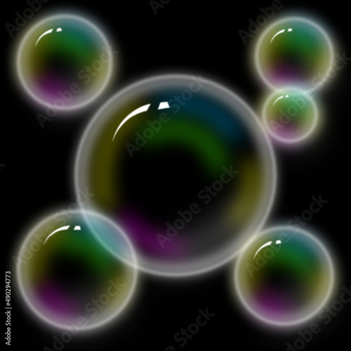 Iridescent soap bubbles on a dark background