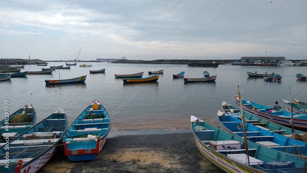 Fishing boats in vizhinjam fishing harbor, Thiruvananthapuram, Kerala, seascape view Fishing boats in vizhinjam fishing harbor, Thiruvananthapuram, Kerala, seascape view