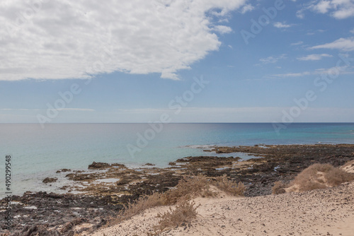 Impressive beaches of dunes and rocks with turquoise water on the island of Fuerteventura