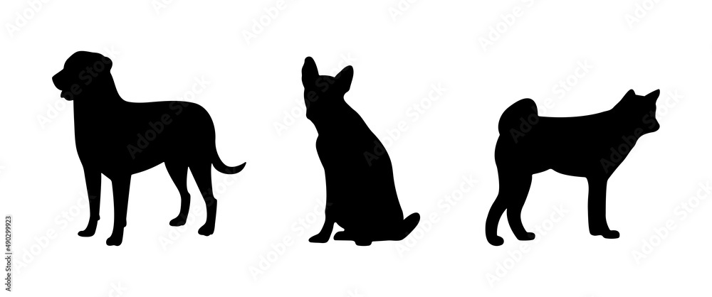 Set of isolated black silhouettes of dogs. Vector illustration.
