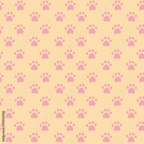 Seamless pattern with traces of cats paws, witchs familiar, mica nap on a yellow background. Vector illustration